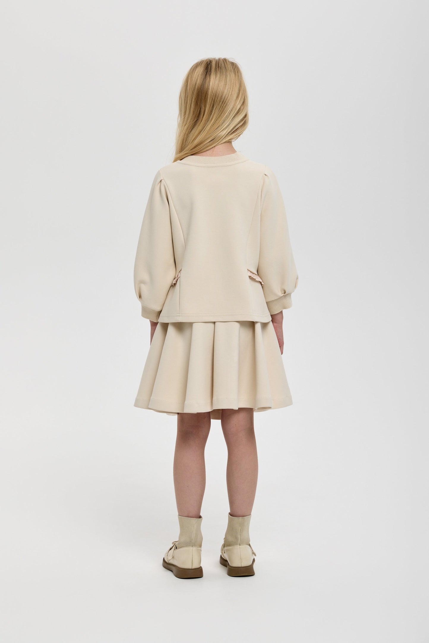 Elegant Footer Jumper and Skirt Set