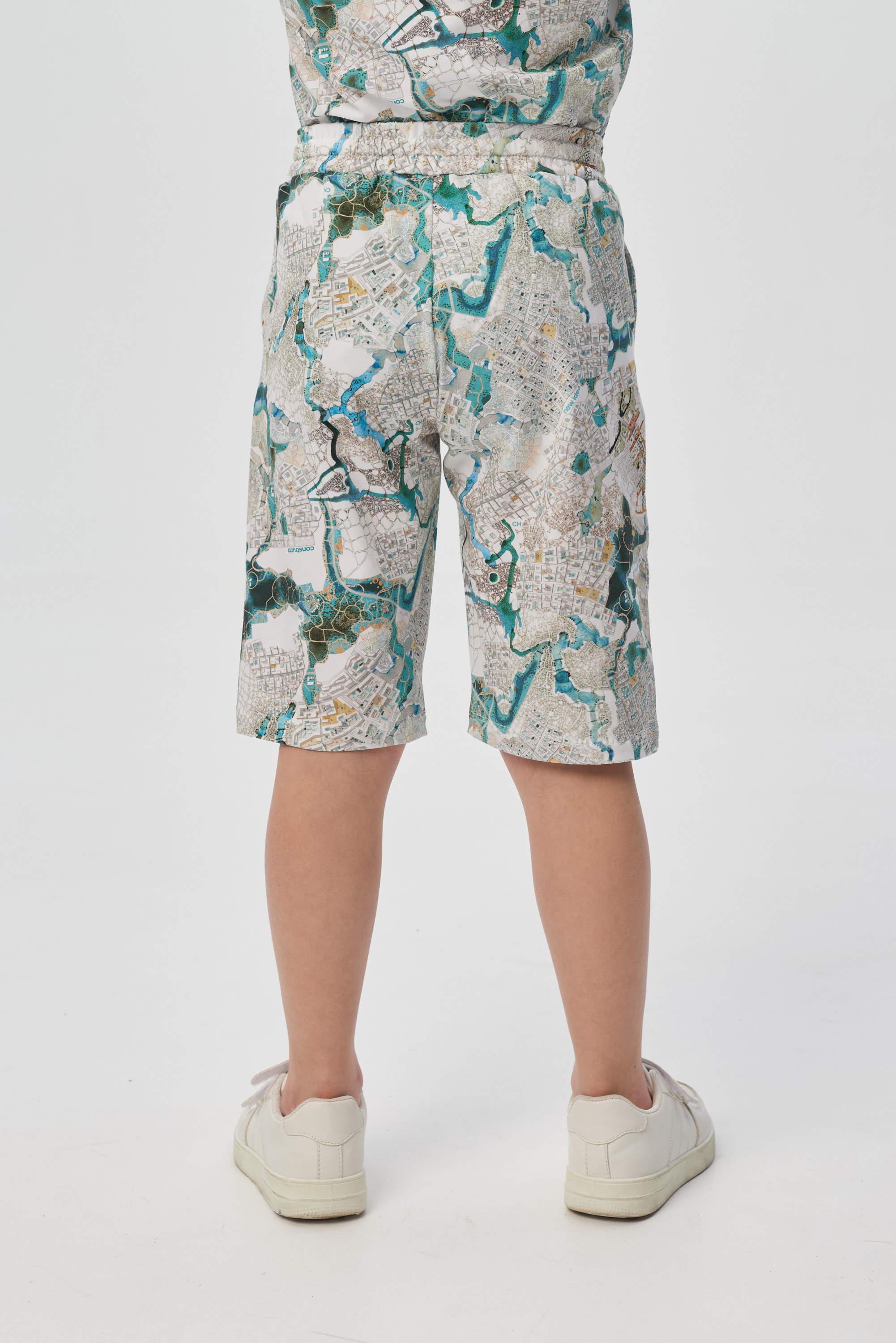 Extended shorts with a proprietary print