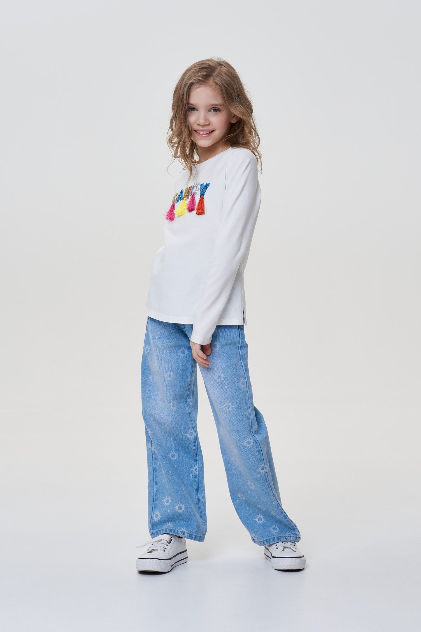 Long-sleeve tee decorated with Candy lettering and ruffles